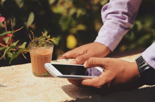 Man holding a smartphone Photo by Rohit Tandon on Unsplash